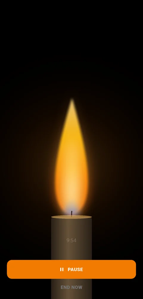 A candle flame filling the screen during a focused meditation sitting in Easy Counter.